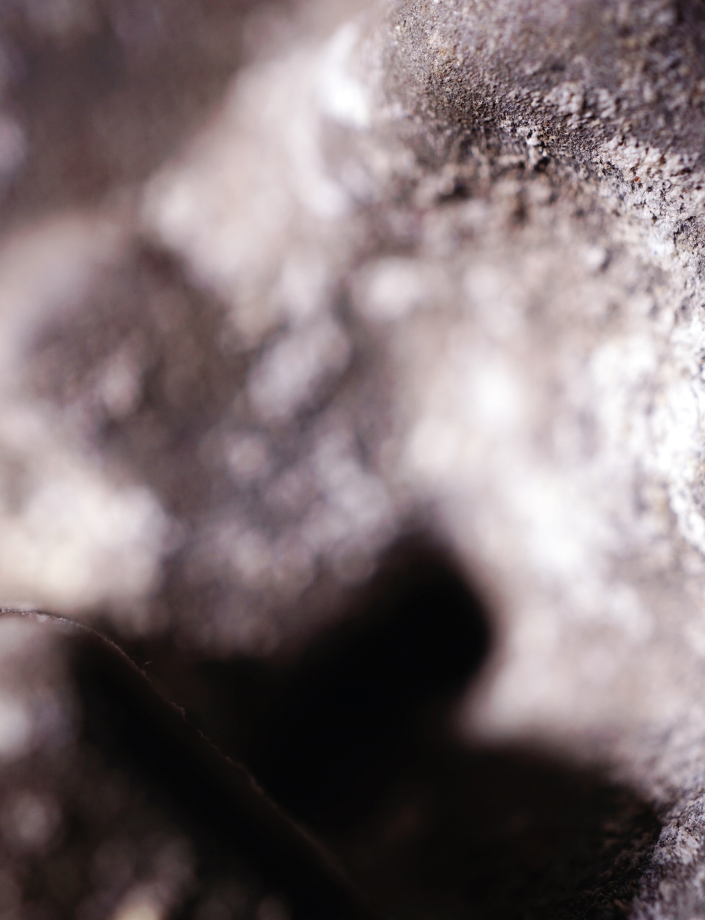 Gray mineral surface, close up