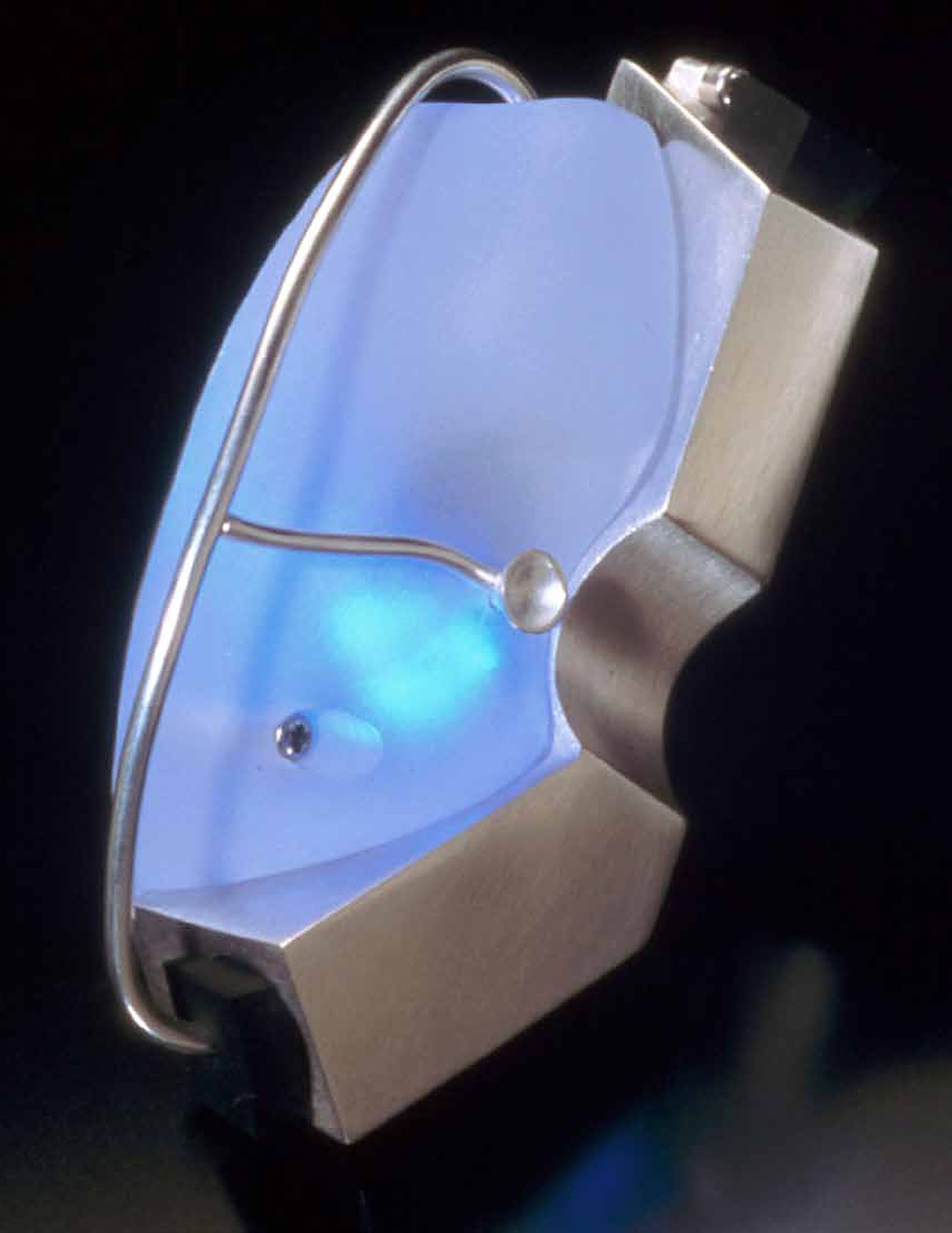 Blue light in a curved metal housing