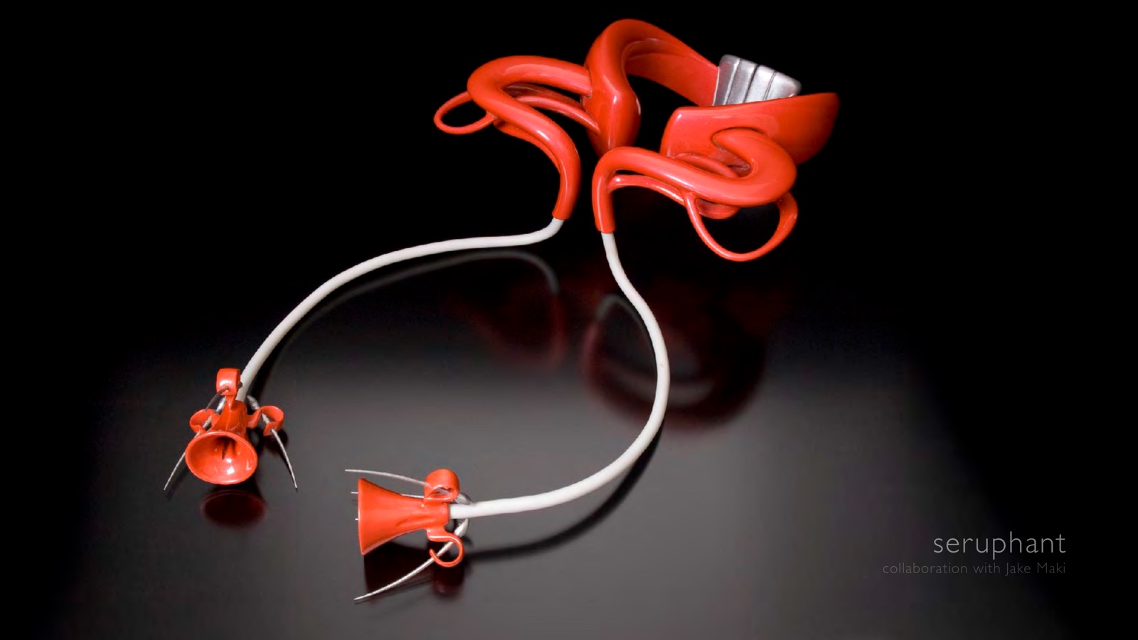 Portfolio page: seruphant, 2004, collaboration with Jake Maki — Photograph of 3D printed torque neckpiece with auto paint.
