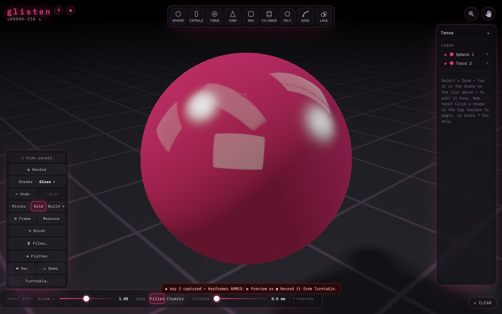glisten mid-morph — a sphere and a swelling torus caught between two keyframes as the turntable turns